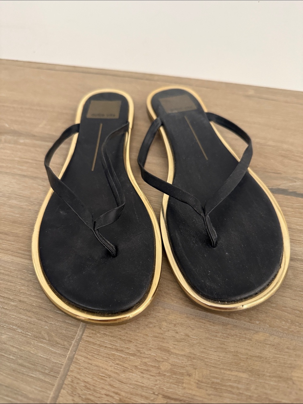 Dolce Vita Black and Gold Slim-Strap Flip Flop Sandals